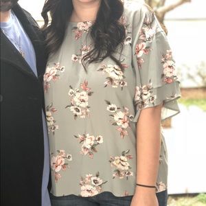 Green floral blouse
